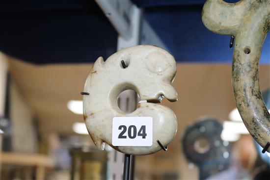 Two Chinese stone carved pendants
